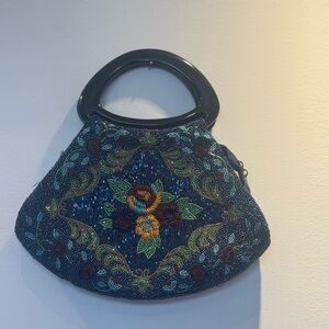 Elegant Blue and Black Crescent Clutch with Intricate Embroidery
